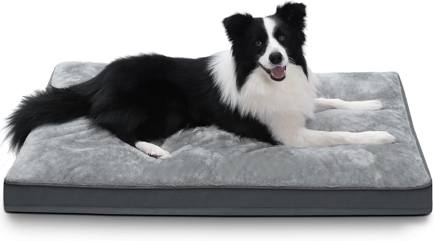 Close-up of gray plush dog crate bed fabric showing texture detail and stitching