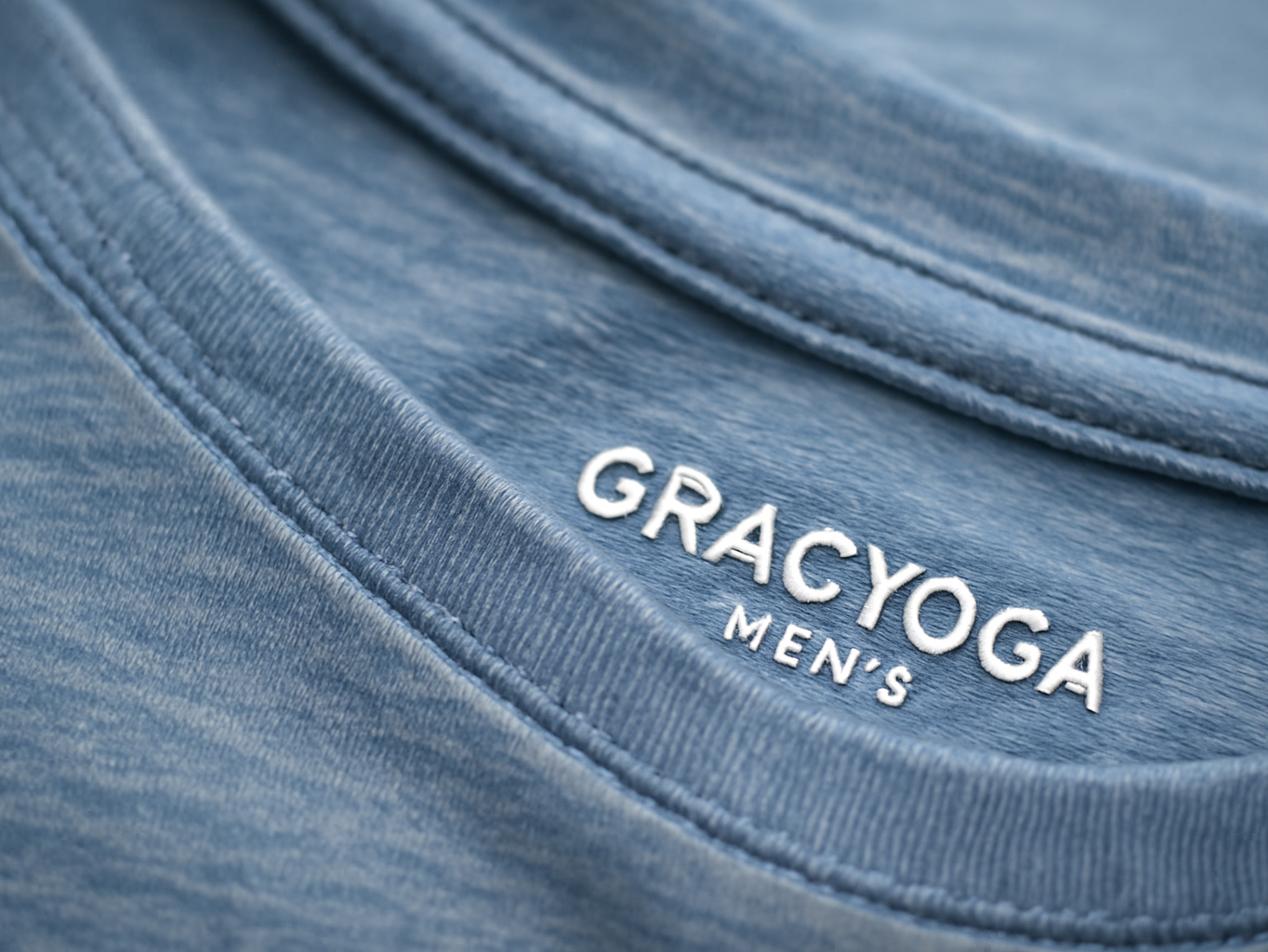 Close-up of Gracyoga Men's T-Shirt fabric weave and seam stitching in natural light, showing premium textile detail