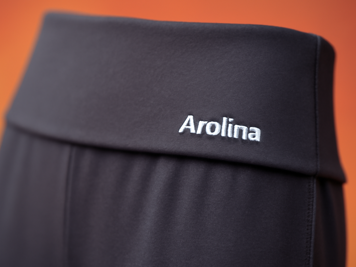 Close-up of foldover waistband on Arolina lounge pants showing fabric weave and stitching detail